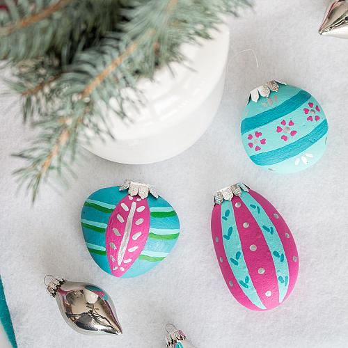 Rocks with Christmas ornaments painted on them