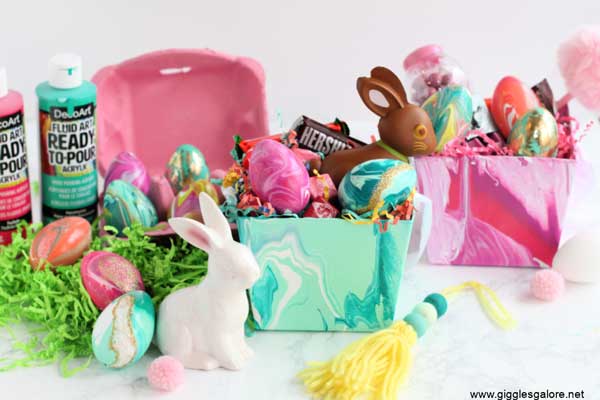 Easter baskets are decorated using acrylic paint pouring