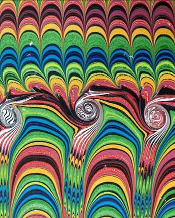 A rainbow water marbling pattern from artist Mercedes Rex.