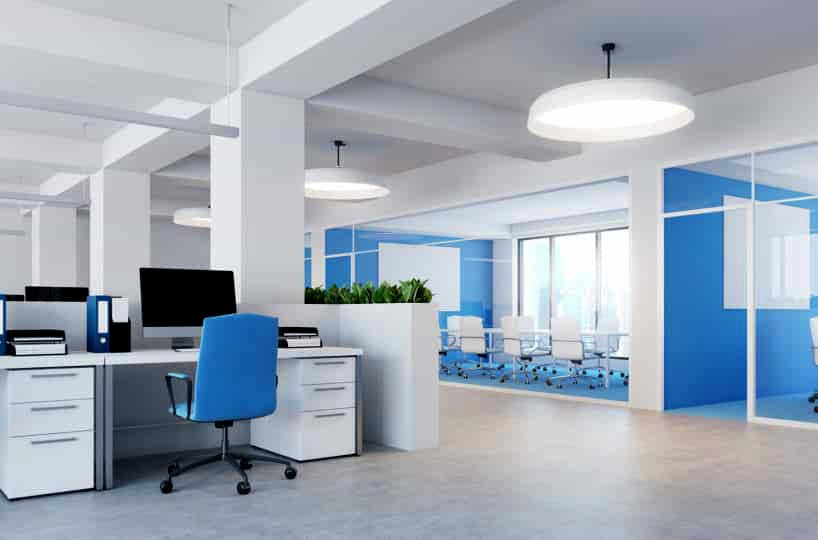 Office with a blue chair and accent wall