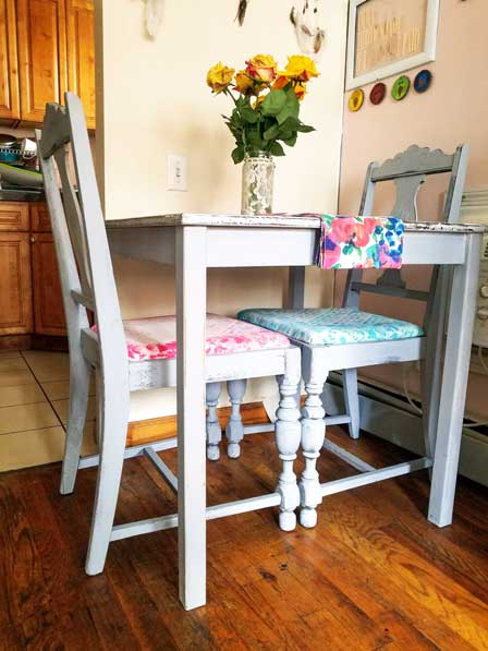 Thrift store chairs and table are given a makeover using DecoArt Chalky Finish for a boho look.