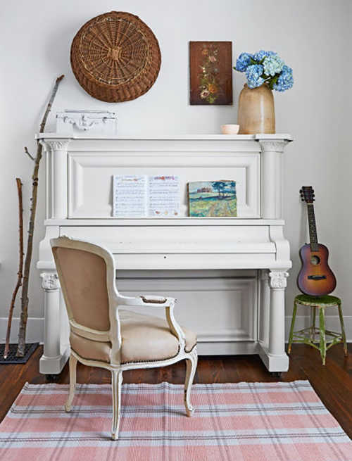 A piano painted with white chalk paint