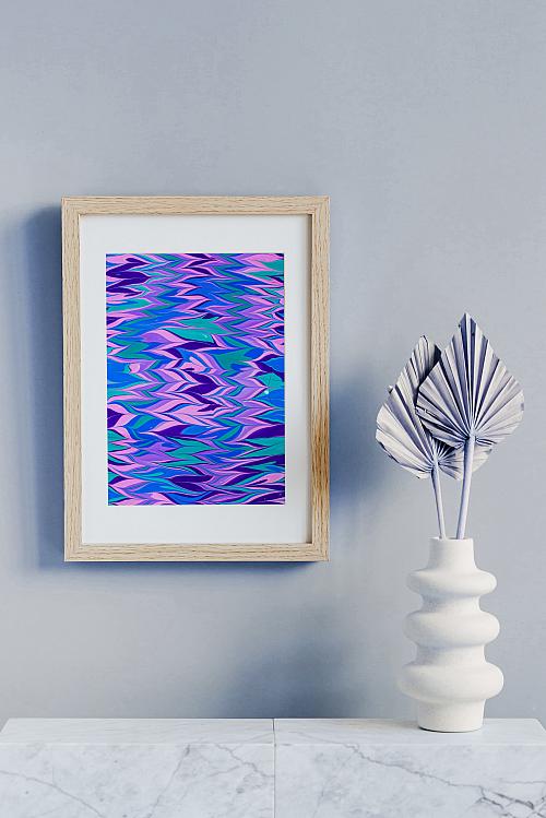 A gelgit or zig-zag pattern water marbling print in cool colors.