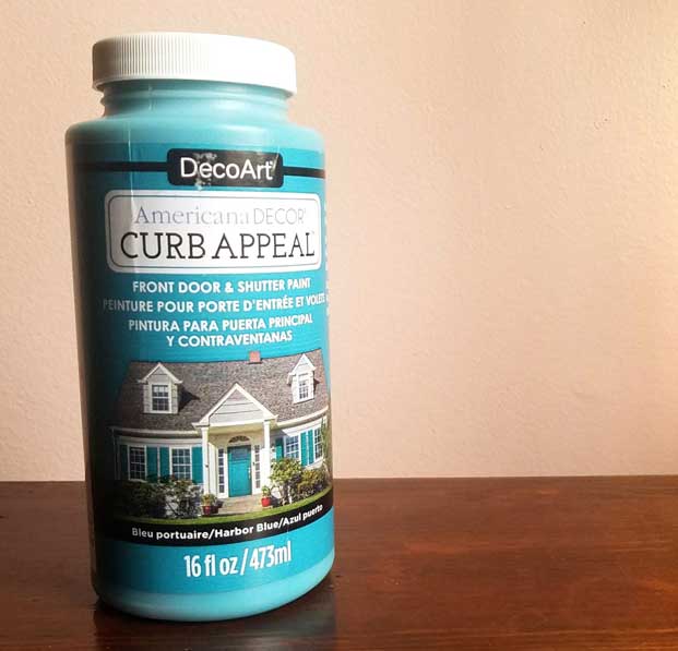 A picture of DecoArt's outdoor paint, curb appeal. in a bright teal blue.