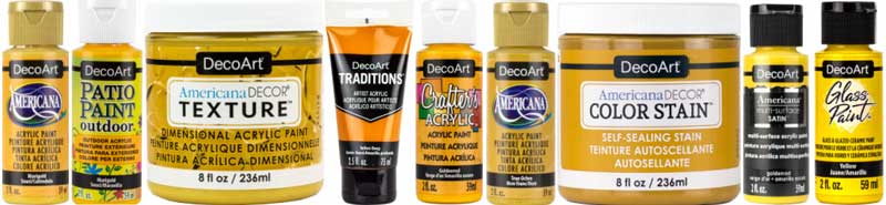 A line-up of various DecoArt's acrylic paints in shades of marigold yellow.