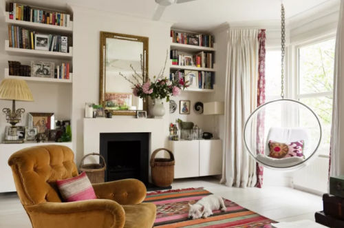 A pinkish red and white living room