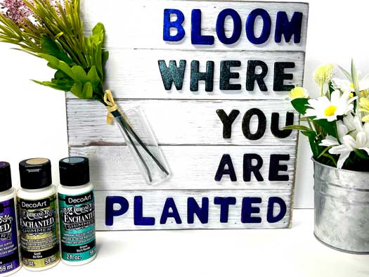 “Bloom where you are planted” spring home decor displayed with DecoArt Enchanted shimmer paints and florals
