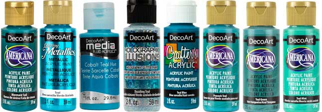A line up of various DecoArt acrylic paint bottles in shades of teal